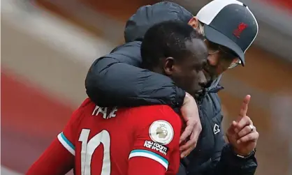  ??  ?? Liverpool’s manager, Jürgen Klopp, with Sadio Mané in March. ‘Everything will be fine,’ he said on Friday. Photograph: Phil Noble/AFP/ Getty Images