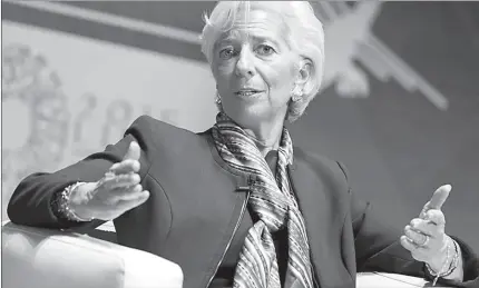  ?? WASHINGTON
-AP ?? IMF Head Christine Lagarde gestures during a speech in a conference.