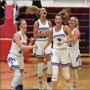  ?? MEDIANEWS GROUP FILE PHOTO ?? Members of the Waterford Our Lady of the Lakes girls basketball team celebrate during their 2020 CHSL Championsh­ip victory.