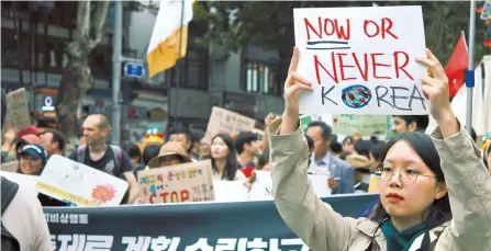  ?? Courtesy of Austin Headrick ?? A Climate Strike takes place in Seoul on Sept. 21, which the producers of a new podcast visited for their first episode.