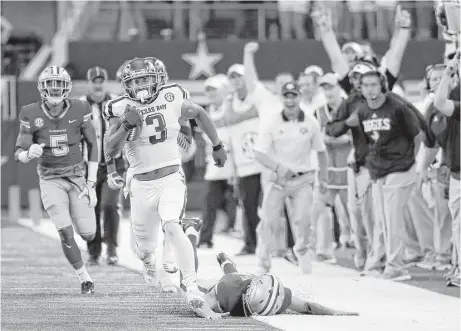  ?? Tony Gutierrez photos / Associated Press ?? Texas A&amp;M wide receiver Christian Kirk contribute­d in more ways than one in the win, hauling in five catches for 110 yards and two touchdowns, including an 81-yard score, as well as adding a 100-yard kickoff return for a touchdown in the fourth quarter.