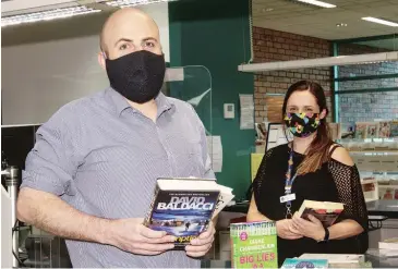  ??  ?? Warragul Library branch manager Daniel Best and library officer Cassie Woodhouse were thrilled to welcome the public back to the Warragul Library.