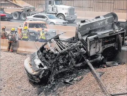  ?? Erik Verduzco Las Vegas Review-journal @Erik_verduzco ?? Emergency responders work the scene of a fatal collision Thursday on an Interstate 15 ramp.