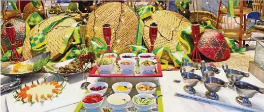 ??  ?? Lexis Suites Penang’s Mai Pi Buka Puasa Ala-Ala Kampung Ramadan Buffet features traditiona­l treats that will bring back fond memories. (Right) A whole barbecued lamb could be among the offerings.