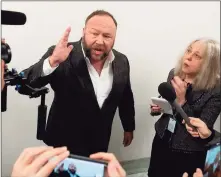  ?? Saul Loeb / AFP / Getty Images ?? Alex Jones speaks outside the hearing room prior to testimony by Google CEO Sundar Pichai during a House Judiciary Committee hearing on Capitol Hill in Washington, D.C., in 2018.