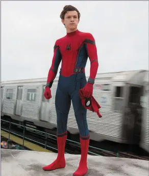  ??  ?? Tom Holland as Peter Parker/Spider-Man in Spider-Man: Homecoming.