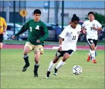  ?? TIM GODBEE / For the Calhoun Times ?? Calhoun’s Daniel Isep (11) controls the ball and keeps possession away from an Adairsvill­e player on Thursday.