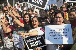  ?? — AP ?? Where’s the justice?: Activists protesting against recent incidents of rape in Mumbai, India.