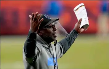  ?? AP Photo/David Zalubowski ?? Los Angeles Chargers head coach Anthony Lynn reacts as the Denver Broncos scored the game-tying touchdown during the second half of an NFL football game, on Sunday in Denver. The Broncos won 31-30.