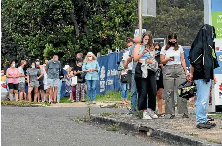  ?? NINE ?? Large queues formed at the Mona Vale Covid clinic in Sydney after two cases appeared in Avalon.
