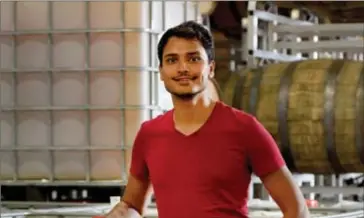  ??  ?? Revel Cider creator Tariq Ahmed puts in around 70 hours a week making and delivering cider.