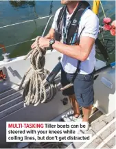  ??  ?? MULTI-TASKING Tiller boats can be steered with your knees while coiling lines, but don’t get distracted