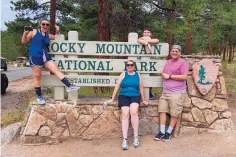  ?? COURTESY ERIN MARSHALL ?? Julia Silver, from left, Shannon Silver, seated, John Silver Jr., and John Silver Sr., from Connecticu­t, pose for a photo during their vacation at Rocky Mountain National Park, in Colorado in July.