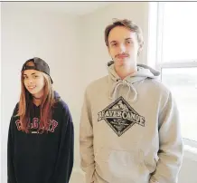  ??  ?? Jack James High School students Jordyn LaPierre, 15, left, and Austin Wurzer-Myers, 17, both say they enjoyed helping build the first floor of a house in Savanna, in northeast Calgary.