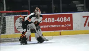  ?? NEWS PHOTO JAMES TUBB ?? Medicine Hat Tigers goaltender Garin Bjorklund prepares himself ahead of puck drop for the first period in the Tigers 2-0 loss to the Calgary Hitmen on Mar. 26