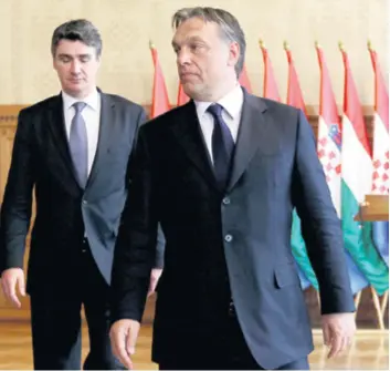  ??  ?? Orbán je s Milanoviće­m bio u korektnim odnosima, no u jeku migrantske krize odnosi su zahladnjel­i. U listopadu 2015. mađarska je vlada “izrazila zaprepašte­nje” izjavom premijera Milanovića koji je Mađarsku opisao kao “slijepo crijevo Europe”
