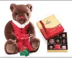  ?? COURTESY OF GODIVA ?? Just in time for the holidays, Godiva has a Christmas plush bear that comes with an assorted nine-piece chocolate holiday gift box.