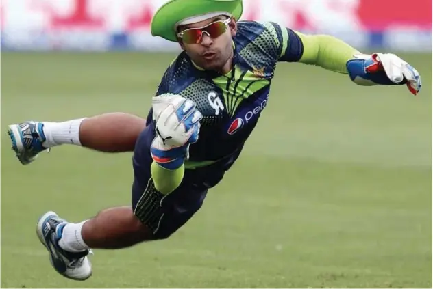 ??  ?? ↑
Umar Akmal could face up to a lifetime ban after he was charged for not reporting match fixing offers, which led to his suspension in February.