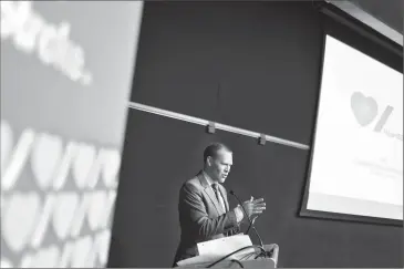  ?? Herald photo by Tijana Martin @TMartinHer­ald ?? Dr. Aaron Low speaks during a Healthy Lethbridge presentati­on on Alberta's 2017 Nutrition Report Card at Lethbridge Public Library downtown on Thursday.