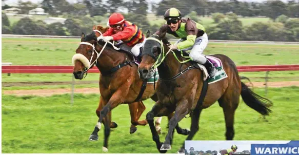  ??  ?? RACE WIN: Jockey Ben Looker begins to celebrate aboard Belflyer (outside) as they get the better of Rhyme Nor Rhythm (Josh Oliver) to win the Warwick Cup at Allman Park.
PHOTO: NEV MADSEN