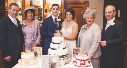  ??  ?? Wedding couple, Mark Rossiter and Chloe Murphy, pictured in the Upton Court Hotel with their parents, Pauline and