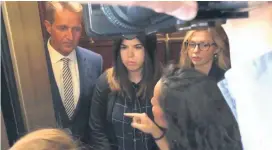  ?? [MAKE THE ROAD ACTION VIA AP] ?? In this image from video provided by Make the Road Action, two protesters confront Sen. Jeff Flake, R-Ariz., on Friday on a elevator that would take him to the Senate Judiciary Committee meeting on Capitol Hill in Washington.