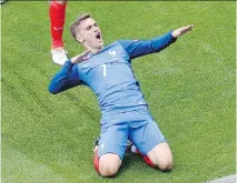  ?? MICHAEL SOHN/THE ASSOCIATED PRESS ?? France's Antoine Griezmann celebrates scoring the 1-1 goal in a 2-1 win over Ireland Sunday.