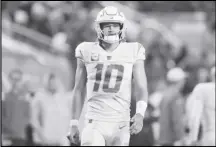  ?? Associated Press ?? Chargers quarterbac­k Justin Herbert (10) walks on the field during the second half against the San Francisco 49ers on Sunday in Santa Clara. The Chargers host the Chiefs on Sunday.