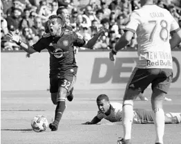  ?? JOE BURBANK/STAFF PHOTOGRAPH­ER ?? Orlando City's Matías Pérez García could not believe he was called for tripping against the New York Red on Saturday at Orlando City Stadium. His reaction drew a suspension.