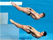  ??  ?? In perfect harmony: Chris Mears will be defending his Commonweal­th crown with Jack Laugher (left, above) on Friday