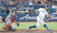  ?? STEVE RUSSELL/TORONTO STAR ?? Yangervis Solarte’s three-run homer capped a five-run seventh for the Jays. Lourdes Gurriel hit the deciding blow in the eighth.