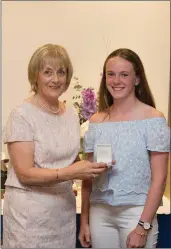  ??  ?? Grace Keane, a winner in the Lady President’s Prize in Blainroe Golf Club, receives her prize from the Lady President Bernie Nelson.