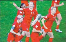  ?? Francois Mori The Associated Press ?? Sam Mewis waves after scoring her first World Cup goal to give the U.S. a 4-0 lead over Thailand on Tuesday in Reims, France. The 26-year-old was inserted into the lineup to make her Cup debut because of an injury to Becky Sauerbrunn.