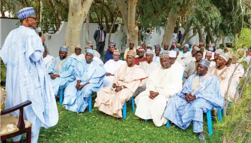  ?? Photo: State House ?? President Muhammadu Buhari (left) with members of the Coalition of Daura Emirate Socio-political Associatio­n in Daura, Katsina State yesterday.