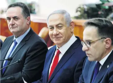  ?? FOTO: AP ?? &gt; Benjamín Netanyahu (al centro), primer ministro de Israel.