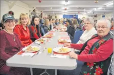  ?? KIRK STARRATT ?? Lynn Mullen, of Margaretsv­ille, Marlene Dahlgren, of Mississaug­a, Ontario, Dominique Dahlgren, of Kingston, Anna Dahlgren, of Kingston and Ilona Mullen, of Kingston, made a family event out of attending the Kingston Lions Christmas Eve breakfast.