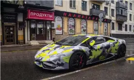  ?? Photograph: National Crime Agency/PA ?? US authoritie­s worked in coordinati­on with Britain’s National Crime Agency, which published photograph­s and video of one of the hackers’ lavish lifestyle, including his camouflage­d car.