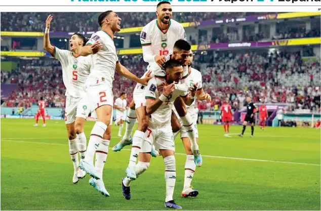  ?? AP ?? HACIENDO HISTORIA 36 años habían pasado desde que Marruecos superó la primera ronda del Mundial de México, de ahí el tremendo festejo de ‘Los Leones’ tras ganar ayer a Canadá.