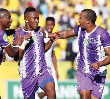  ??  ?? WE’RE GOING TO THE FINAL: Lebohang Maboe celebrates his goal with Bandile Shandu and Deolin Mekoa during Maritzburg United’s Nedbank Cup semi-final victory against Mamelodi Sundowns at the Harry Gwala Stadium yesterday. (See story below.)