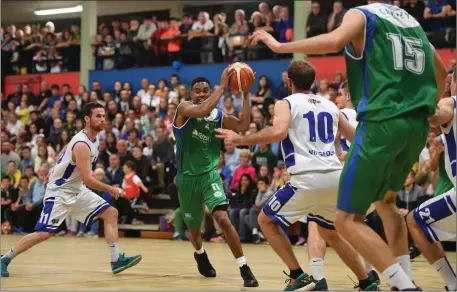  ?? Photo by Domnick Walsh / Eye Focus ?? Trae Pemberton, Irish TV Warriors and Paddy Mullan, Belfast Star in action during the Mens Basketball Superleagu­e clash played in the Tralee Sports Complex