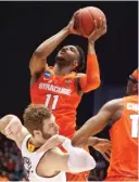  ?? | JOHN MINCHILLO/ AP ?? Syracuse’s Oshae Brissett puts in two of his 23 points against Arizona State on Wednesday.