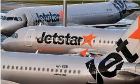  ?? Photograph: William West/AFP/Getty Images ?? A passenger who uses a wheelchair says he had to be lifted across a gap in the air bridge at Darwin Airport to board his Jetstar flight.