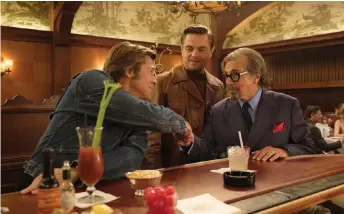  ?? — Courtesy of Columbia Pictures ?? Leonardo DiCaprio, Brad Pitt and Al Pacino in ‘Once Upon a Time in ... Hollywood’.