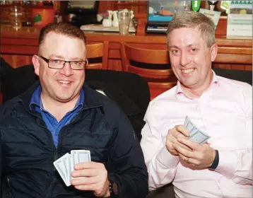  ??  ?? Michael O’Shaughness­y and Gabriel taking part in the Courtown Golf Club poker classic.