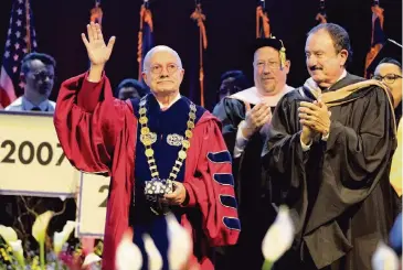  ?? PEDRO PORTAL pportal@miamiheral­d.com ?? Dr. Eduardo J. Padrón, who is retiring after 25 years as Miami Dade College president, reacts as he gets recognized Saturday during the Hialeah and Wolfson campuses’ commenceme­nt ceremony at the Wastco Center in Coral Gables.