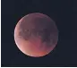  ??  ?? RARE A blood moon