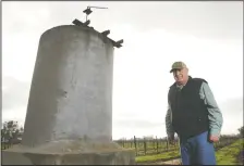  ??  ?? North San Joaquin Water Conservati­on District President Joe Valente stands near the existing pipeline as he talks about the South System Groundwate­r Improvemen­t Plan in Lodi on Friday.