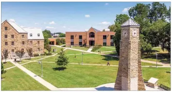  ??  ?? The Centennial Clock Tower quad at the University of Arkansas at Monticello features a new Student Success Center that houses all essential resources under one roof.