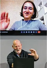  ?? JEFF LANGE / AKRON BEACON JOURNAL ?? Nastiya Khamurda (top), in Dnipro, Ukraine, and Mark Merzweiler, in Akron, wave to each other during an online English class on Thursday.