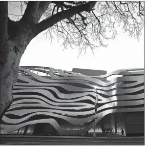  ?? Los Angeles Times/TNS/MYUNG J. CHUN ?? The Petersen Automotive Museum and its distinctiv­e facade in the early morning in Los Angeles